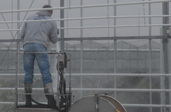 How do you use glass cleaner in a greenhouse?