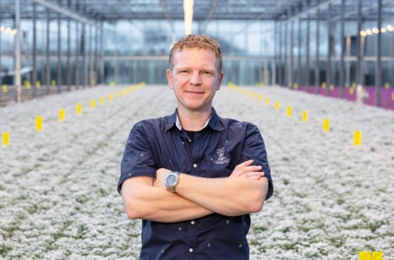 Michael Visser in greenhouse
